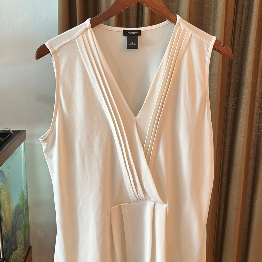 Brand. We never WORN beautiful blouse